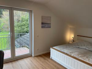 Postel nebo postele na pokoji v ubytování Traumhaus am Wald 2 + 31 fotografií