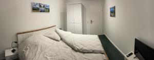 Postel nebo postele na pokoji v ubytování Traumhaus am Wald 2