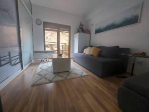 Posezení v ubytování Cosy apartment in Mavrovo + 2 fotografie