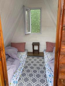Ένα ή περισσότερα κρεβάτια σε δωμάτιο στο De La Terrasse IZNIK