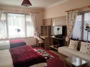 Shepherds Lodge B&B TV 또는 엔터테인먼트 센터
