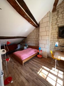 Posteľ alebo postele v izbe v ubytovaní Gîte de Frau