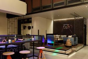 A restaurant or other place to eat at Moxy Osaka Shin Umeda