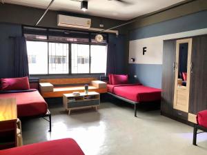 Postel nebo postele na pokoji v ubytování Amity Poshtel