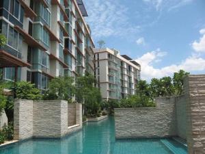 a swimming pool in front of a building at The IRIS no.301 : 2 Bedrooms near Huamark Station in Ban Bang Toei (1)