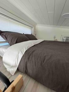 Krevet ili kreveti u jedinici u okviru objekta Delightful 1-bedroom modern tiny home