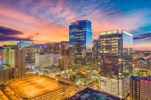 a view of a city skyline at sunset at Highrise the Heart of Downtown in Phoenix