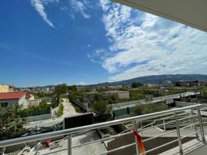 a view of a city from a balcony at Vila Zini in Vlorë