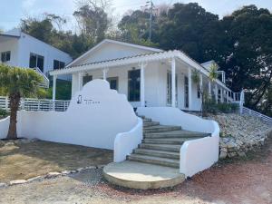 淡路市にあるTiz wan kudashiの白い家