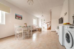 A television and/or entertainment centre at traditional suburbs maisonette