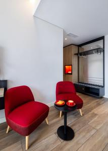 TV a/nebo společenská místnost v ubytování Ink Hotel