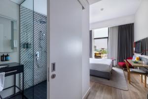 Postel nebo postele na pokoji v ubytování Ink Hotel