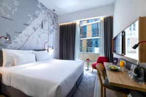 Postel nebo postele na pokoji v ubytování Ink Hotel