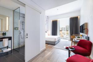 Postel nebo postele na pokoji v ubytování Ink Hotel