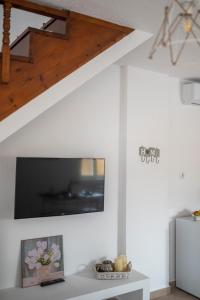 A television and/or entertainment centre at traditional suburbs maisonette