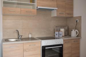 A kitchen or kitchenette at traditional suburbs maisonette