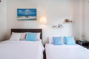 Postel nebo postele na pokoji v ubytování Sorrento Pool Villa Bang Lamung Pattaya + 29 fotografií