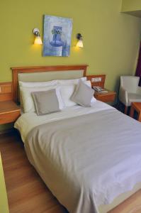 Postel nebo postele na pokoji v ubytování Hotel Doruk