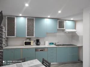 A kitchen or kitchenette at Casa Mario