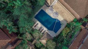 an overhead view of a swimming pool in a house at Artini 2 Cottage Ubud in Ubud