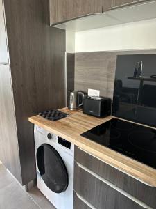 Kuchyňa alebo kuchynka v ubytovaní La maison Baz