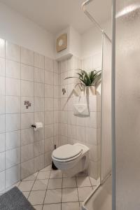 Un baño de Modernes Apartment am Campus - Parken - Smart-TV - Kaffeevollautomat