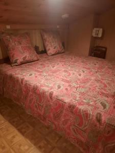 Ένα ή περισσότερα κρεβάτια σε δωμάτιο στο Appartement SAINT CYPRIEN PLAGE 6 Couchages