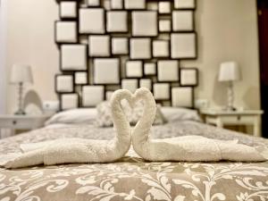 Posteľ alebo postele v izbe v ubytovaní APARTAMENTO SAN NICOLAS