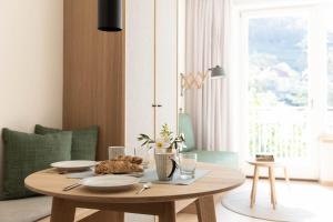 A seating area at Ladurnerhof Boutique Apartments Meran