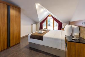 Postel nebo postele na pokoji v ubytování Baymari Suites Design Florya