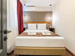 Postel nebo postele na pokoji v ubytování Baymari Suites Design Florya