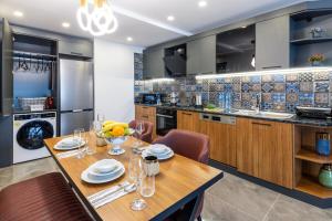 Kuchyň nebo kuchyňský kout v ubytování Baymari Suites Design Florya