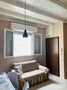 Postel nebo postele na pokoji v ubytování Casa vacanze "La pavoncella sarda " vicinissima al mare