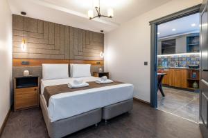 Postel nebo postele na pokoji v ubytování Baymari Suites Design Florya