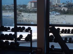 a room with a view of a beach from a window at דירות נופש מרינה הרצליה in Herzliya B