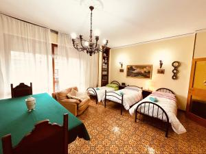 A bed or beds in a room at Affittacamere Umberto&Marisa