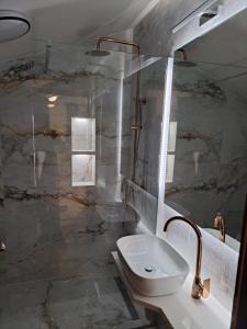 Koupelna v ubytování Apartmani Duško Karaman