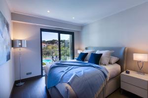 Posteľ alebo postele v izbe v ubytovaní Parc du Cap Luxury Apartment + 34 fotografií