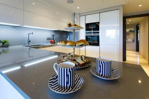 Kuchyňa alebo kuchynka v ubytovaní Parc du Cap Luxury Apartment