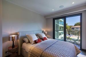 Posteľ alebo postele v izbe v ubytovaní Parc du Cap Luxury Apartment