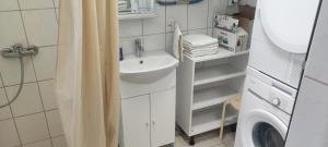 Kúpeľňa v ubytovaní Krisztina Apartman