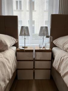 Ένα ή περισσότερα κρεβάτια σε δωμάτιο στο Apartament Olivia Business Suite +19 φωτογραφίες