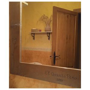 a mirror in a room with a door at El Quinto Pino Riópar in Riópar +42 photos