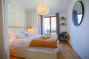 Posteľ alebo postele v izbe v ubytovaní Manoir 4 étoiles - 2 chambres, proche lac