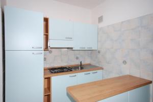 Kuchyňa alebo kuchynka v ubytovaní Residenza Bianco Nero + 22 fotografií
