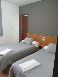 Postel nebo postele na pokoji v ubytování A Concha