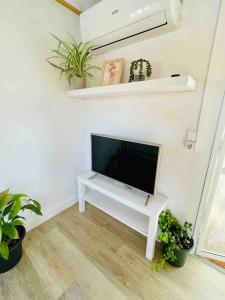 TV a/nebo společenská místnost v ubytování Alquiler de casa Vacacional + 9 fotografií