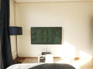 TV a/nebo společenská místnost v ubytování 2 Pièces Cosy