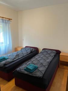 a room with a bed and a couch in it at Apartment Sole in Poreč