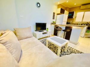 A kitchen or kitchenette at Panda Grey with balcony Hurghada center